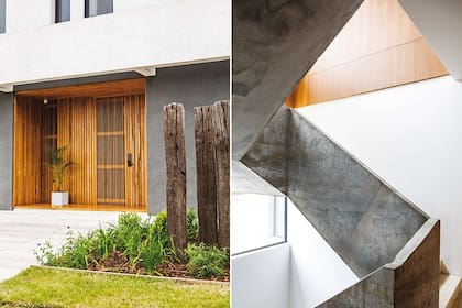 Como una cinta de hormigón, la escalera une los tres niveles de la edificación