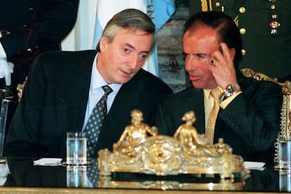 Néstor Kirchner junto a Carlos Menem
