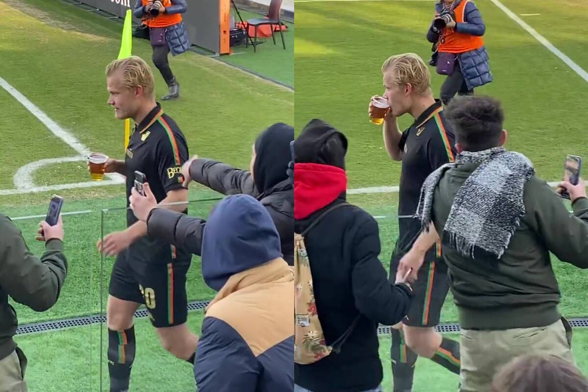 Con el vaso de cerveza en su mano, el futbolista recibió el cariño de los hinchas