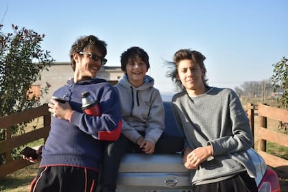 Con Felipe y Benjamín, sus hijos.