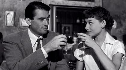 Con Gregory Peck, en una escena de La princesa que quería vivir (1953)