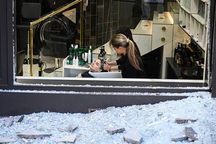 Con los esfuerzos de paz en el limbo, Kiev llora los 23 muertos en un ataque ruso