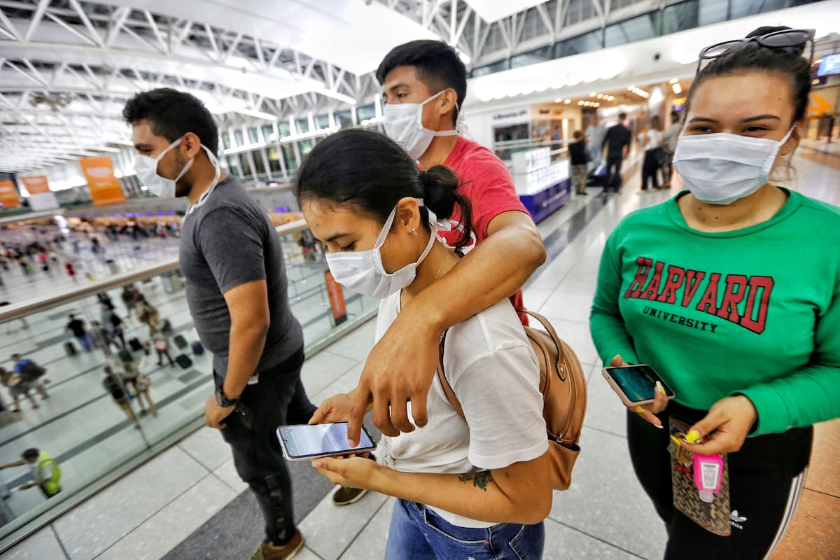 coronavirus aeropuerto ezeiza italia barbijos avión