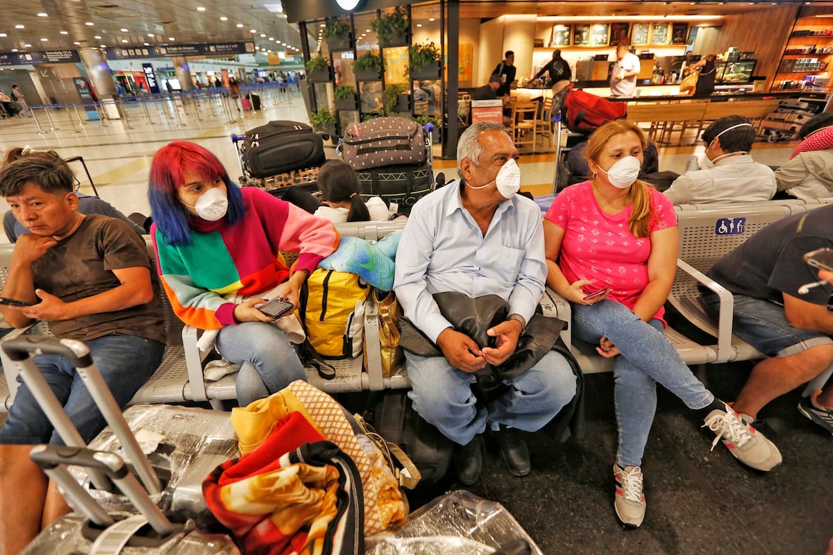 coronavirus aeropuerto ezeiza italia barbijos avión