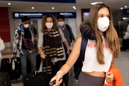 Coronavirus Ezeiza Vuelos cancelados Italia Barbijos pasajeros