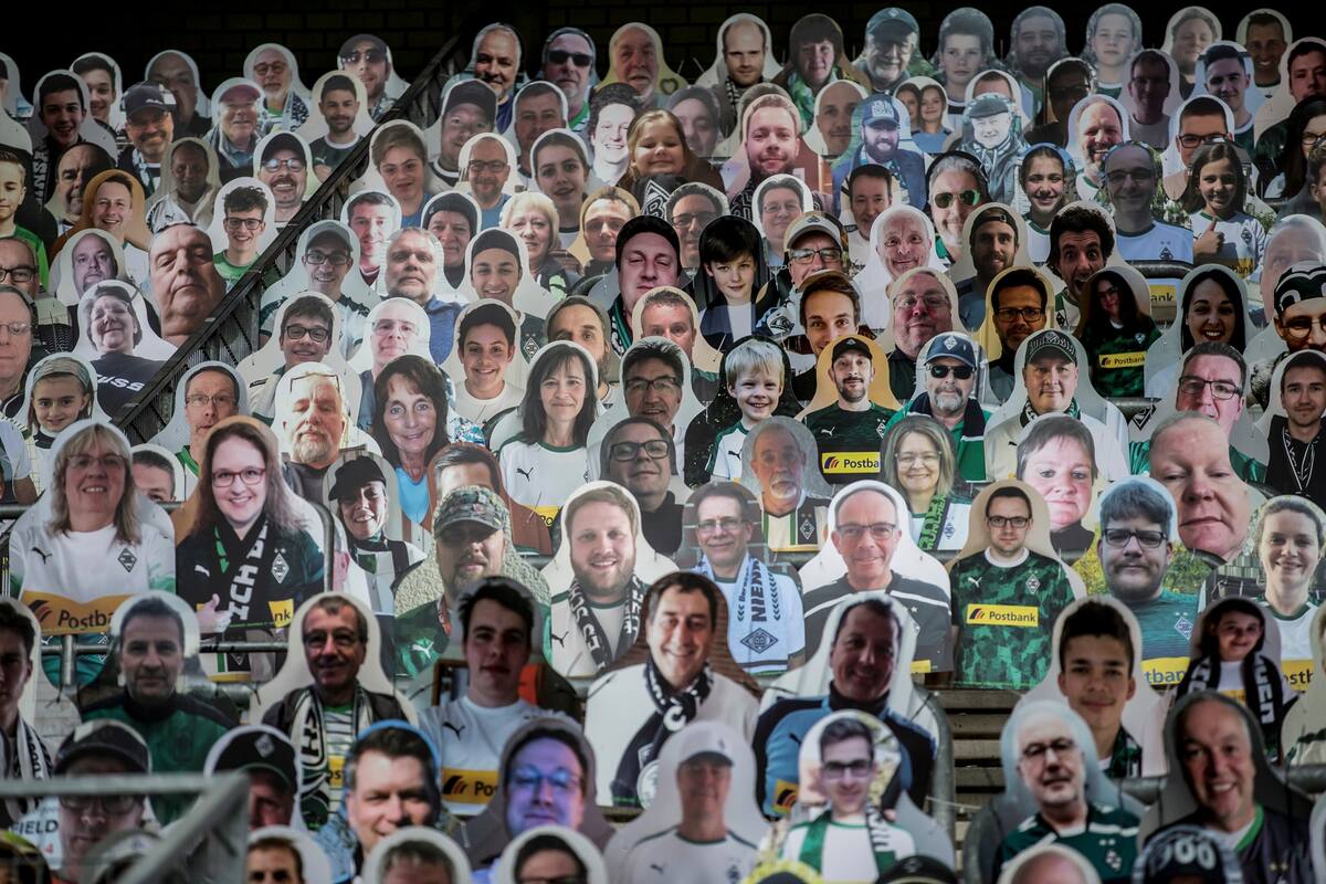 Coronavirus. Hinchas de cartón y en tamaño real para "alentar" a los clubes en la Bundesliga.
