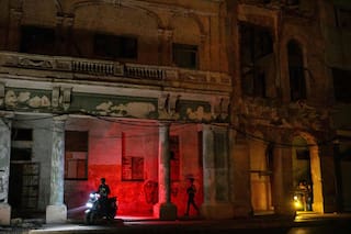 Cubans sleep on seaside boardwalk to seek relief from crippling blackouts and summer heat