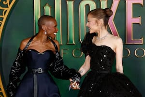 Cynthia Erivo, left, and Ariana Grande pose for photographers upon arrival at the premiere of the film "Wicked For Good" in London, Monday, Nov. 10, 2025. (Photo by Millie Turner/Invision/AP)