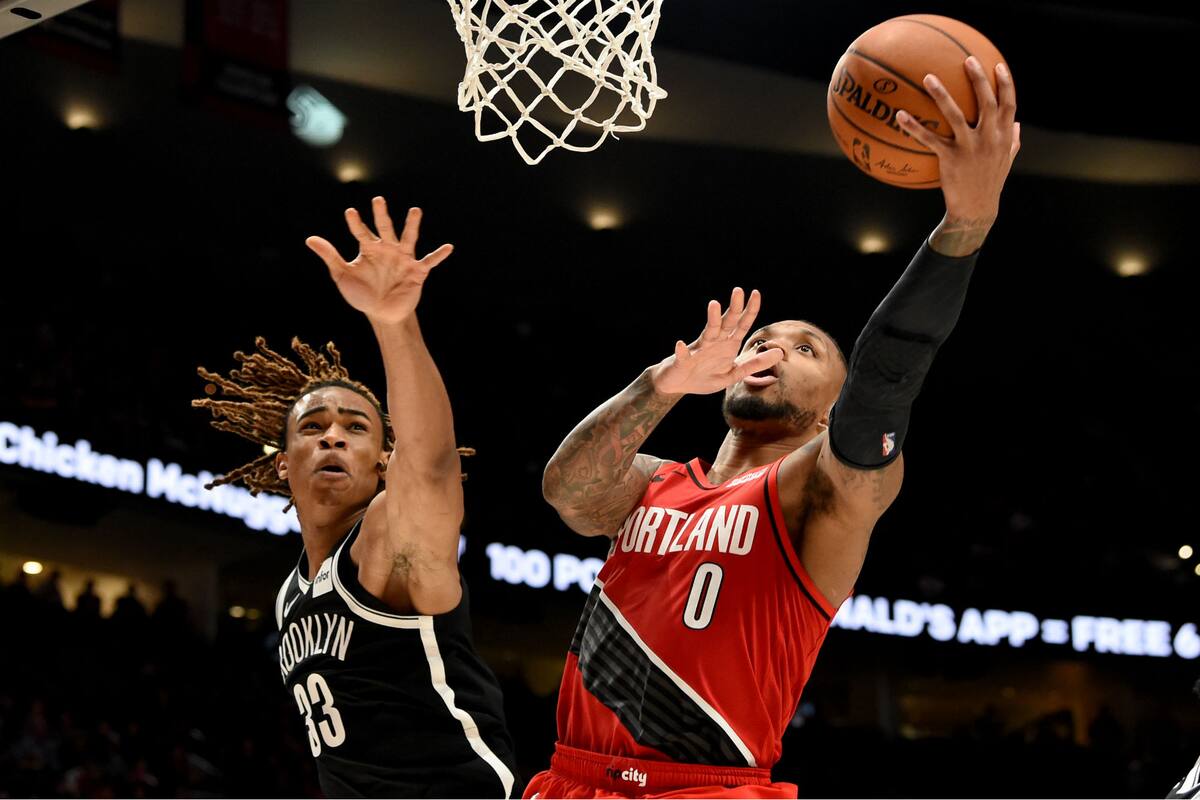 Damian Lillard en su noche de gloria: anotó 60 puntos ante Brooklyn Nets, récord personal y de Portland, su franquicia.