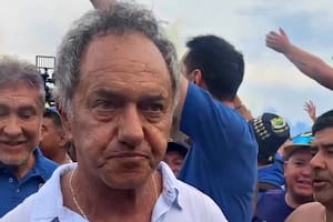 Daniel Scioli asistió al banderazo de los hinchas de Boca en la playa de Copacabana