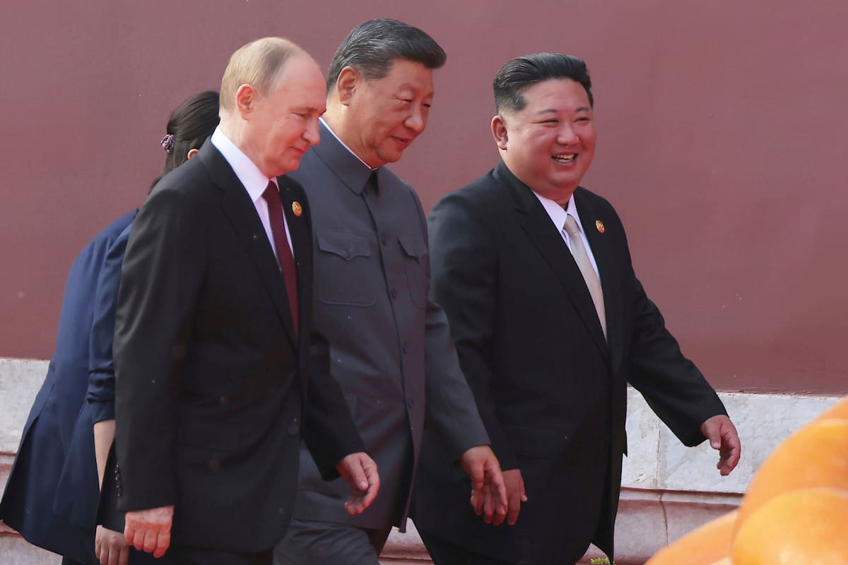 De izquierda a derecha, Vladimir Putin, Xi Jinping y Kim Jong-un