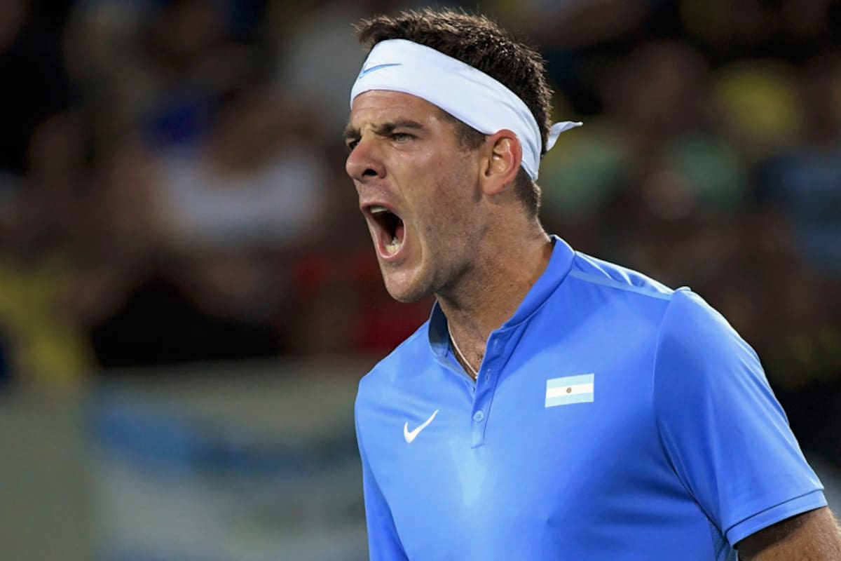 Del Potro celebra la obtención del primer set ante Djokovic en Rio 2016