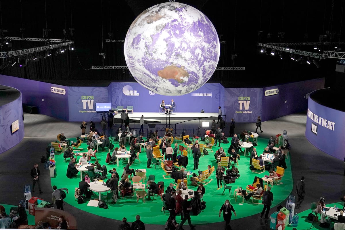 Delegates gather inside the venue on another day at the COP26 U.N. Climate Summit in Glasgow, Scotland, Wednesday, Nov. 3, 2021. The U.N. climate summit in Glasgow gathers leaders from around the world, in Scotland's biggest city, to lay out their vision for addressing the common challenge of global warming. (AP Photo/Alberto Pezzali)