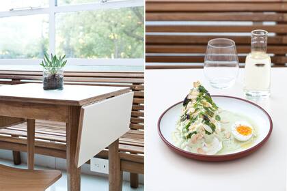 Detalle de las mesas con extremos rebatibles y uno de los platos estrella de Narda Comedor: el akusay con crema de hierbas