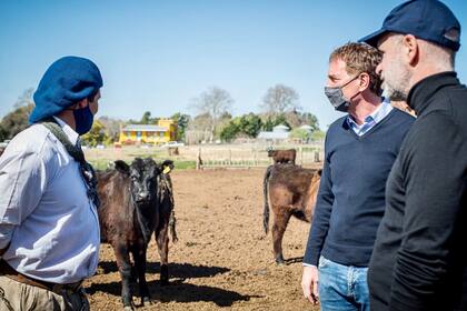 Diego Santilli y Horacio Rodríguez Larreta visitaron ayer un campo en Junín