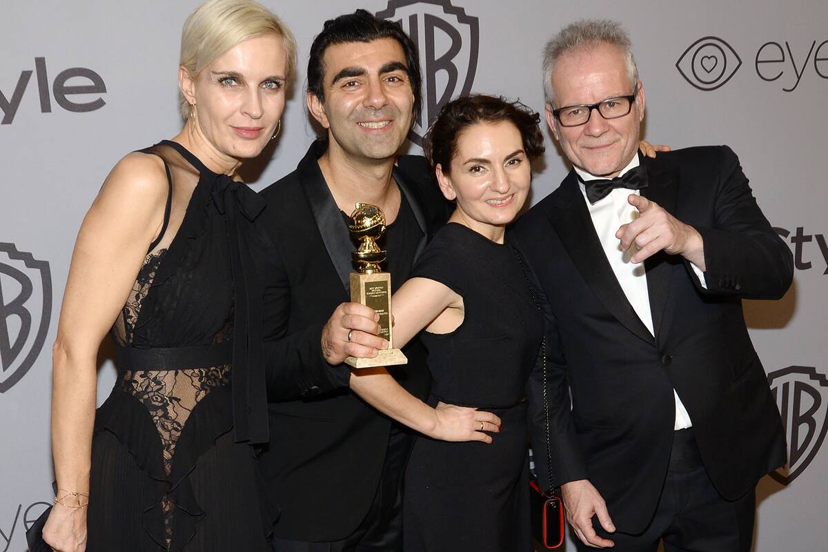 Director of "Into The Fade" Fatih Akin (2L) and guests attend the 19th Annual InStyle And Warner Bros. Pictures Golden Globe After-Party on January 7, 2018, in Beverly Hills, California. / AFP PHOTO / Tara Ziemba