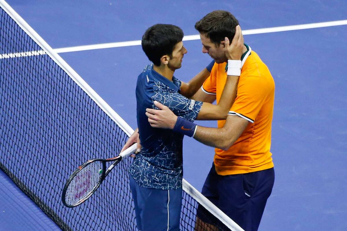 Djokovic y Del Potro se saludan tras la final