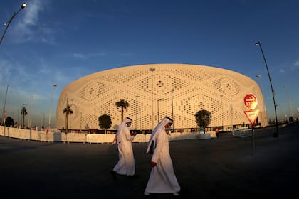 DOHA, QATAR - 06 DECEMBER: General view of spectators outside the Al Thumama Stadium at sunset during the FIFA Arab Cup Qatar on December 06, 2021 in Doha, Qatar. (Photo by MB Media/Getty Images)