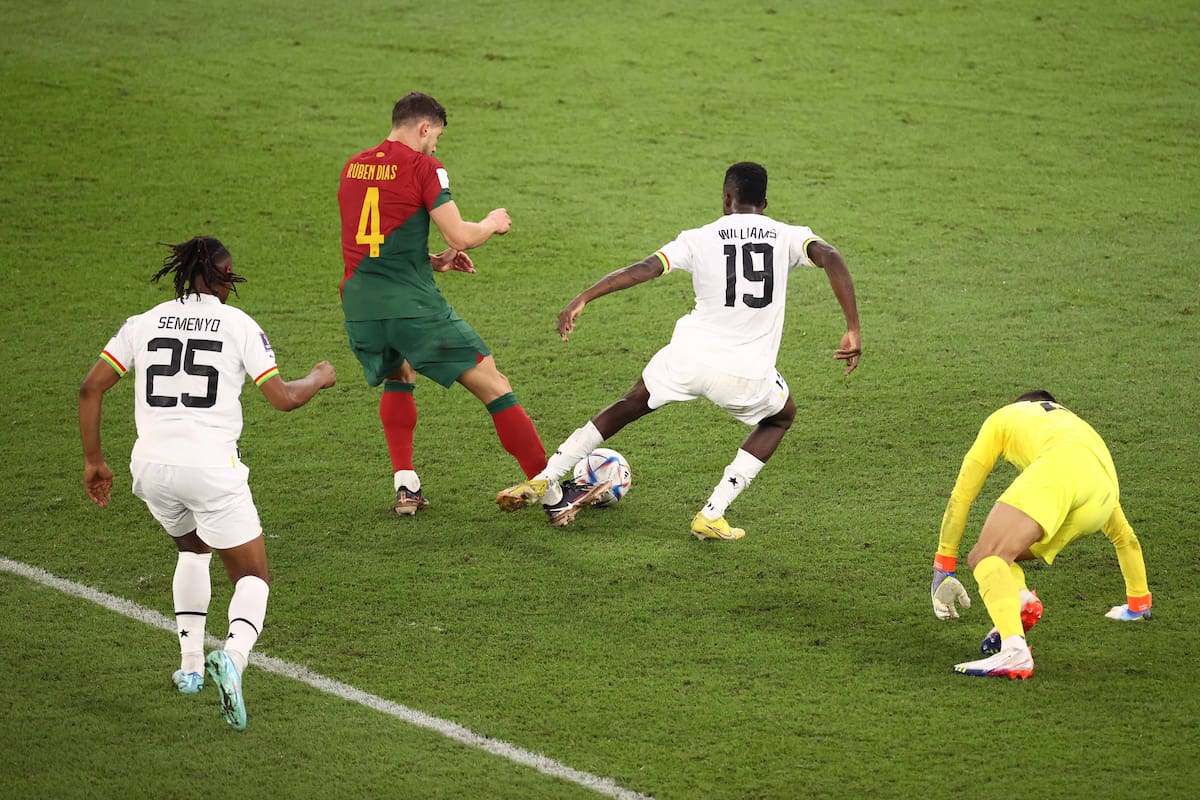 DOHA, QATAR - NOVEMBER 24: Inaki Williams of Ghana battles for possession with Ruben Dias of Portugal during the FIFA World Cup Qatar 2022 Group H match between Portugal and Ghana at Stadium 974 on November 24, 2022 in Doha, Qatar. (Photo by Robert Cianflone/Getty Images)