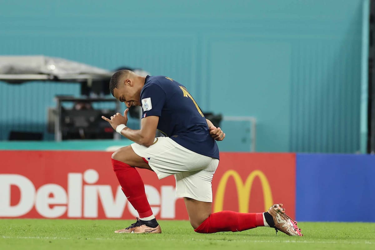 DOHA, QATAR - NOVEMBER 26: Kylian Mbappe of France celebrates after scoring to give the side a 1-0 lead during the FIFA World Cup Qatar 2022 Group D match between France and Denmark at Stadium 974 on November 26, 2022 in Doha, Qatar. (Photo by Youssef Loulidi/Fantasista/Getty Images)