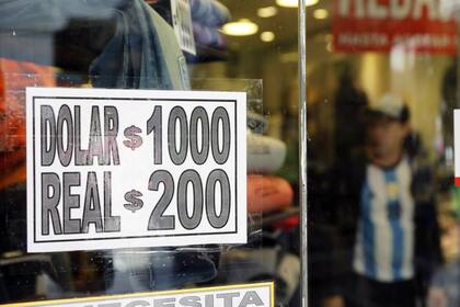 $1000 = 1 dólar