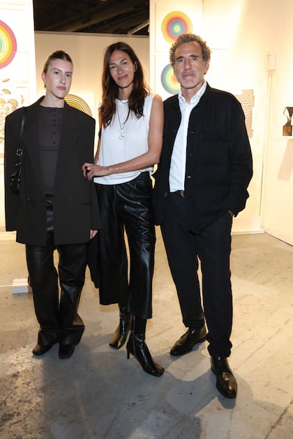 Dolores Trull con Cala y
Alejandro Pueyrredón