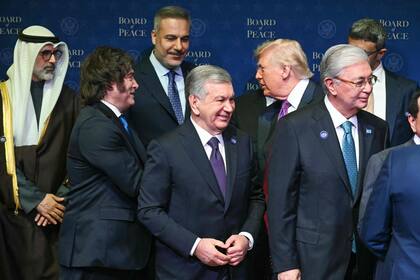 Donald Trump y Javier Milei durante la foto grupal