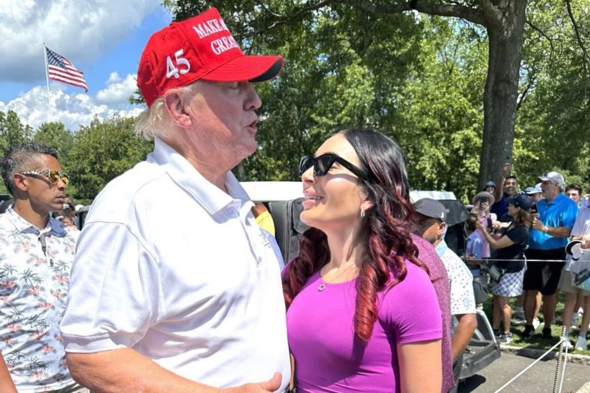 Donald Trump y Laura Loomer, una agitadora de extrema derecha conocida por su retórica incendiaria