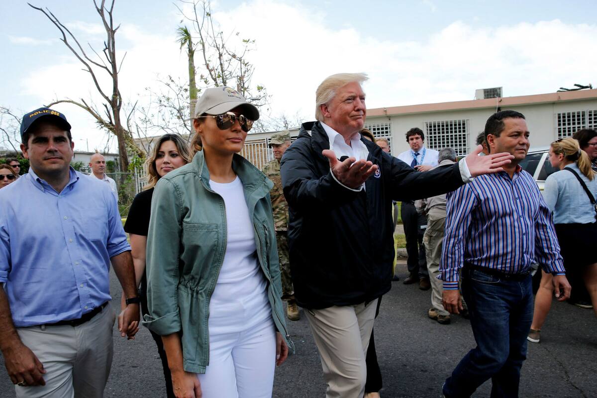 Donald Trump y Melania en Puerto Rico el 3 de Octubre del 2017 durante su recorrida por Guaynabo, un barrio perjudicado por el huracán María