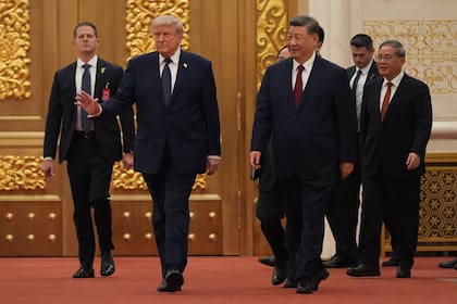 Donald Trump y Xi Jinping llegan a la cena de Estado en el Gran Salón del Pueblo, en Pekín