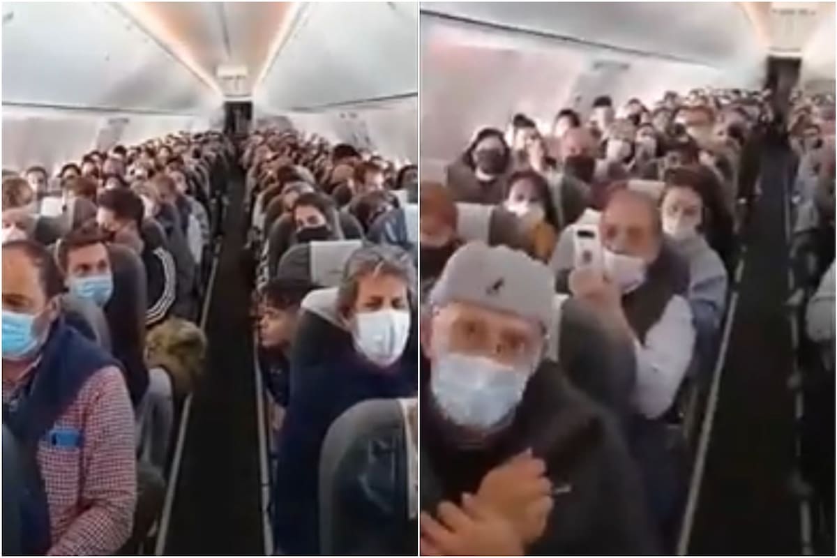 Dos excombatientes de Malvinas recibieron un homenaje a bordo de un avión con destino a Puerto Madryn (Foto: Captura de video)