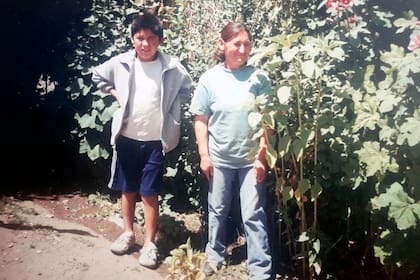 Durante su infancia, con su madre