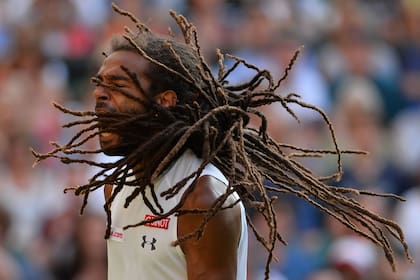 Dustin Brown celebra su victoria ante Nadal