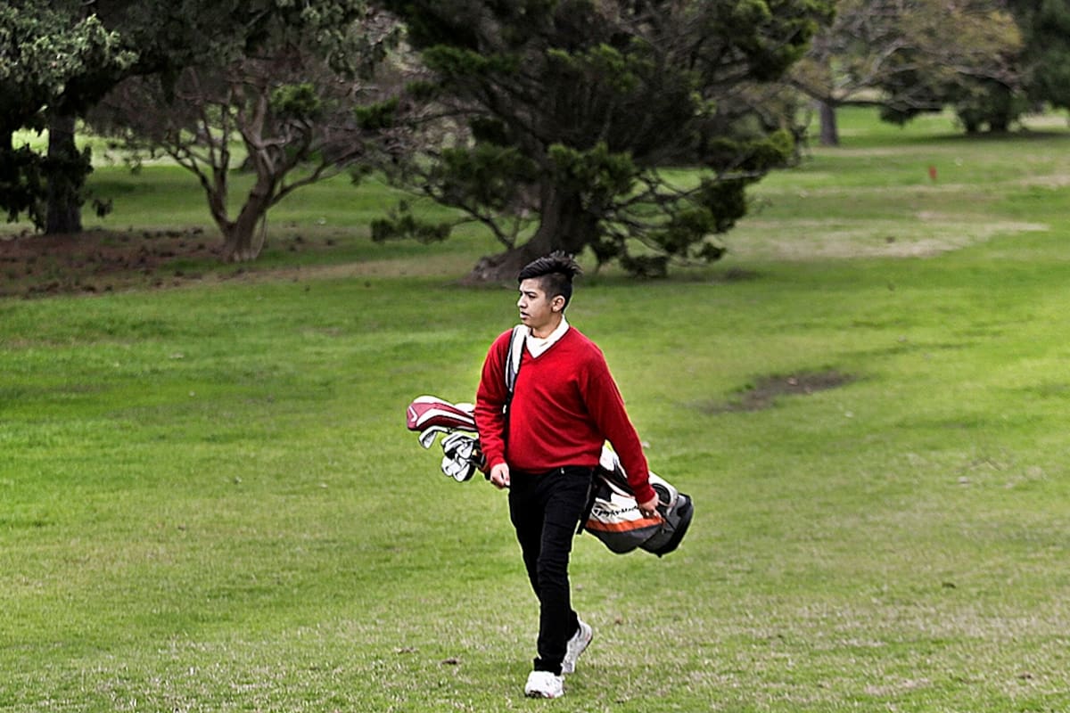 Dylan Reales, tiene 14 anos y juega al golf desde los 8.