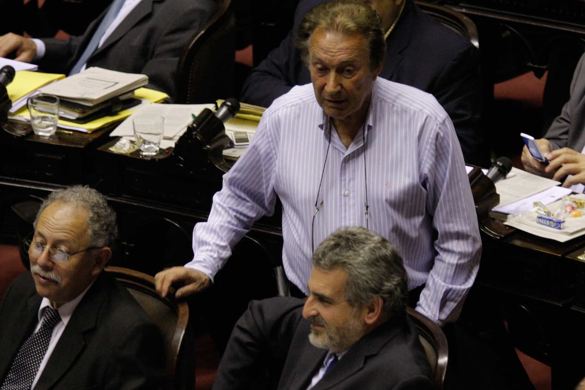 Eduardo Borocó junto a Agustín Rossi