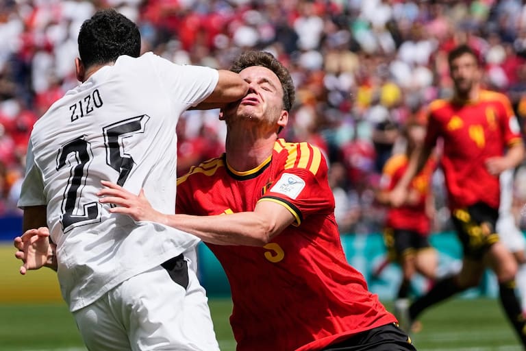 Egypt's Zizo and Belgium's Maxim De Cuyper battle for the ball during the World Cup Group G soccer match in Seattle, Monday, June 15, 2026. (AP Photo/Lindsey Wasson)