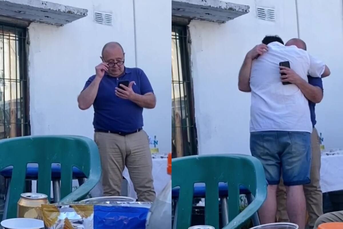 El abrazo entre el padre y su hijo luego de la emotiva lectura de la carta despedida