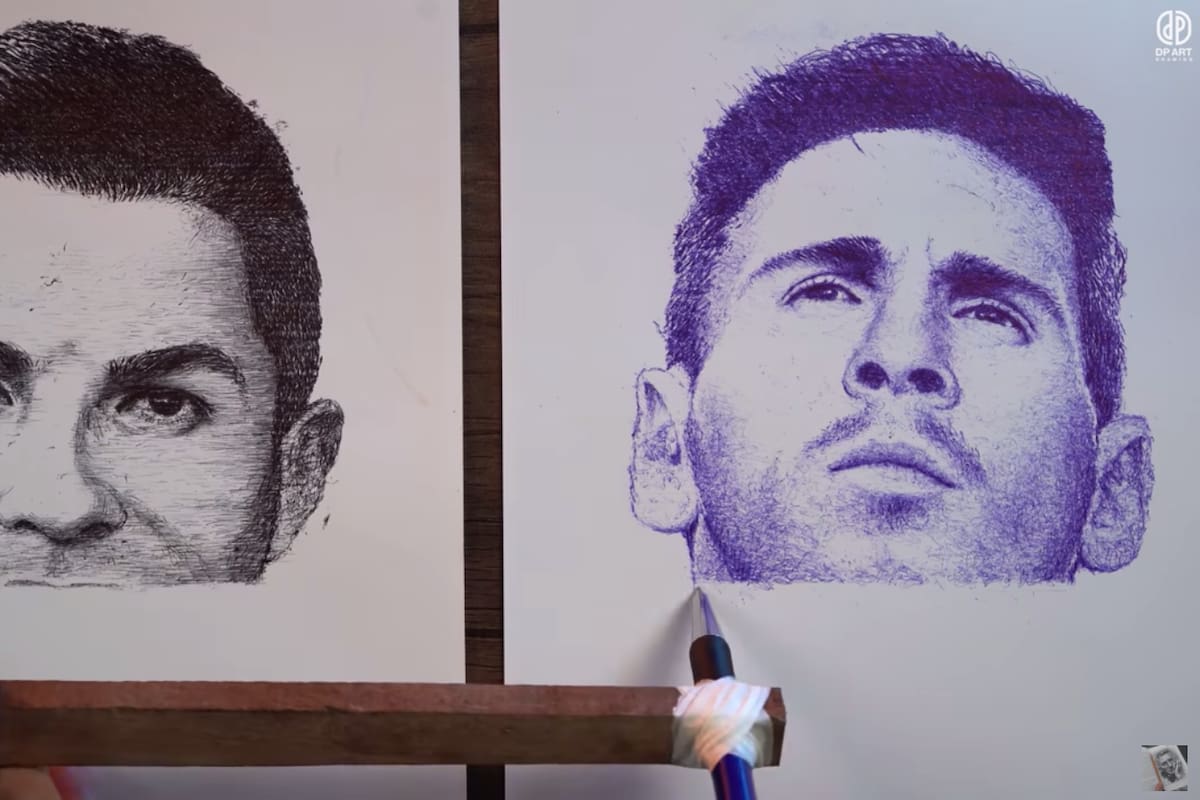 El artista pinta a los dos futbolistas a la vez