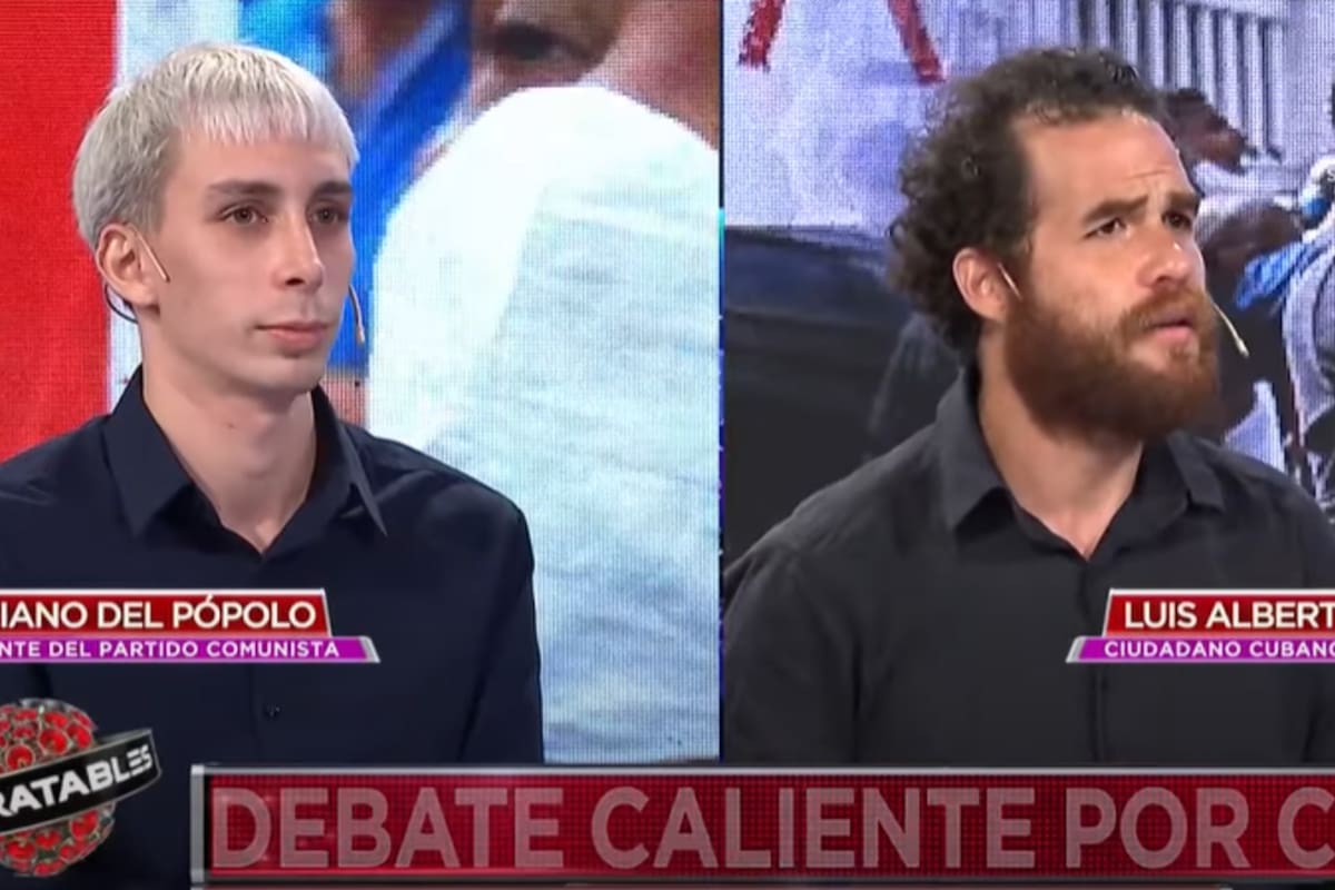 El becario doctoral del CONICET Mariano del Pópolo y el ciudadano cubano Luis Alberto Mariño. Fuente: América