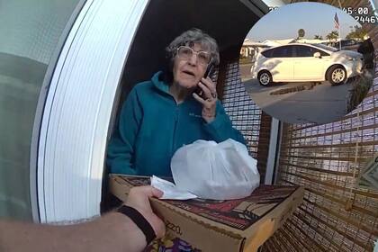 El caimán se escondió debajo de una camioneta blanca, frente al domicilio de una anciana que esperaba un pedido de comida