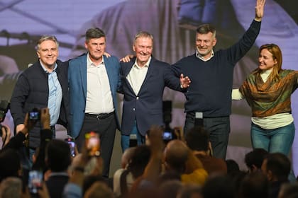 El candidato a intendente Daniel Passerini junto a Martín Llaryora y Juan Schiaretti