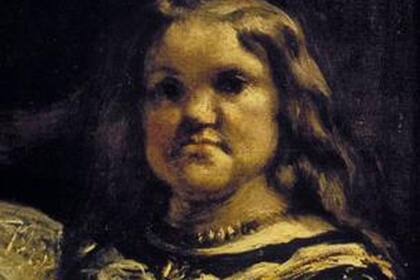Los reyes Felipe IV y Mariana de Austria aparecen reflejados en el espejo del fondo, pero no sabemos si son reales o son a su vez una pintura