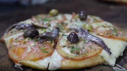 La pizza estilo Napolitana, uno de los clásicos de El Cuartito
