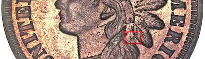 El detalle que le da valor es la marca "L" que se observa en el anverso de la moneda