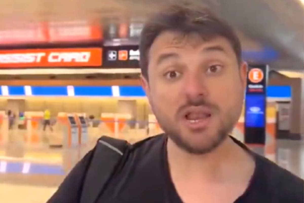 El dirigente del Movimiento de Trabajadores Excluidos (MTE), Juan Grabois, al momento de ser increpado por una mujer en Ezeiza