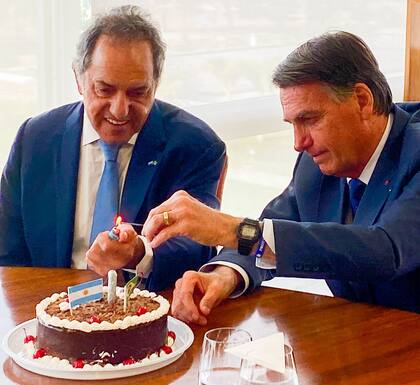 El embajador Daniel Scioli junto al presidente de Brasil, Jair Bolsonaro, en el palacio del Planalto.