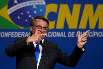 El entonces presidente de Brasil Jair Bolsonaro, durante un evento en Brasilia, en abril de 2022. (AP Foto/Eraldo Peres, Archivo)