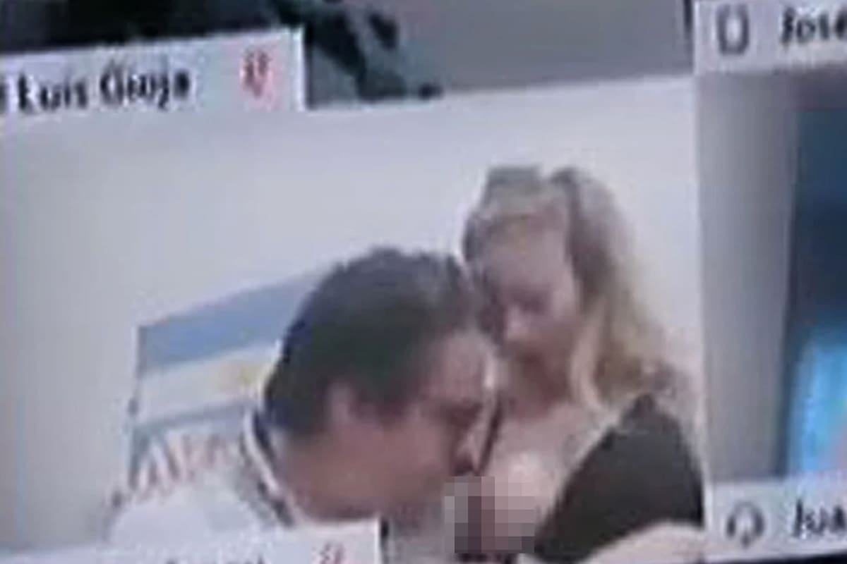 El exdiputado Juan Ameri y su pareja, en la escena que desató un escándalo en Diputados