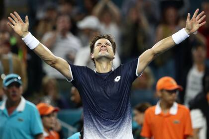 El festejo de David Ferrer después de dar el gran golpe en Miami