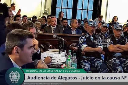 El fiscal Juan Manuel Dávila, en el momento de pedir la pena de perpetua para los ocho imputados